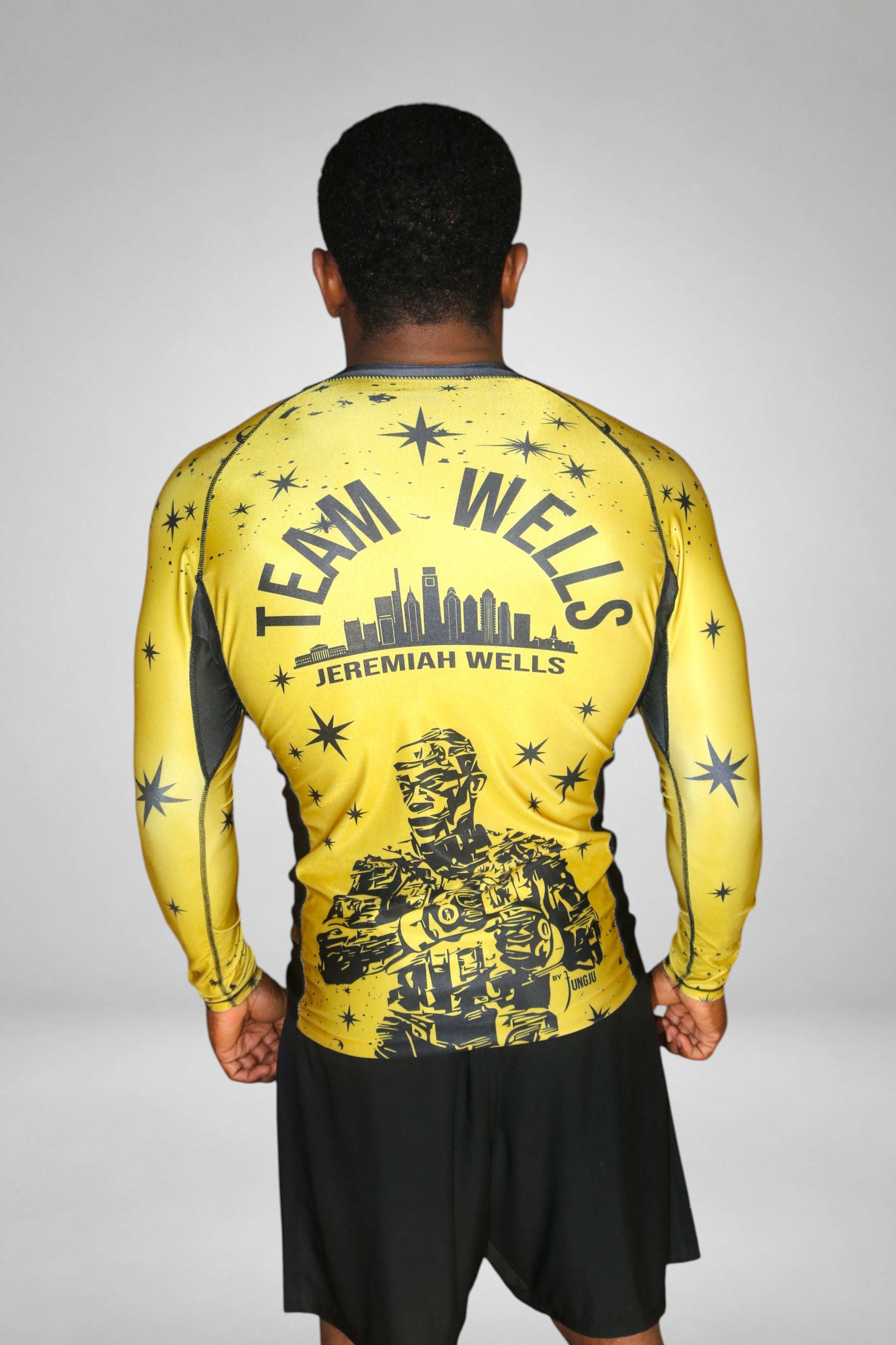 Team Wells Rashguard Winner's Gold